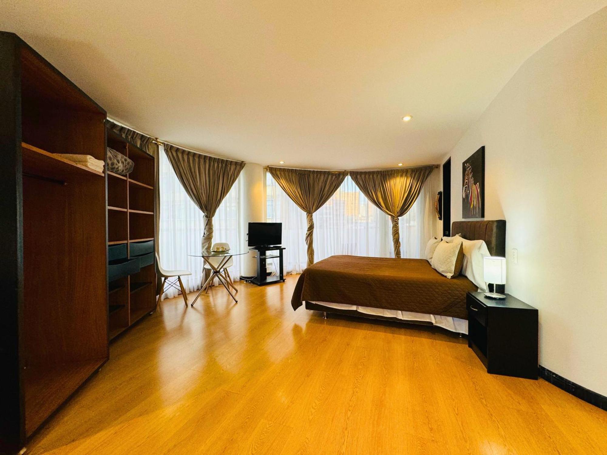 Aparta Suite Continental Богота Экстерьер фото